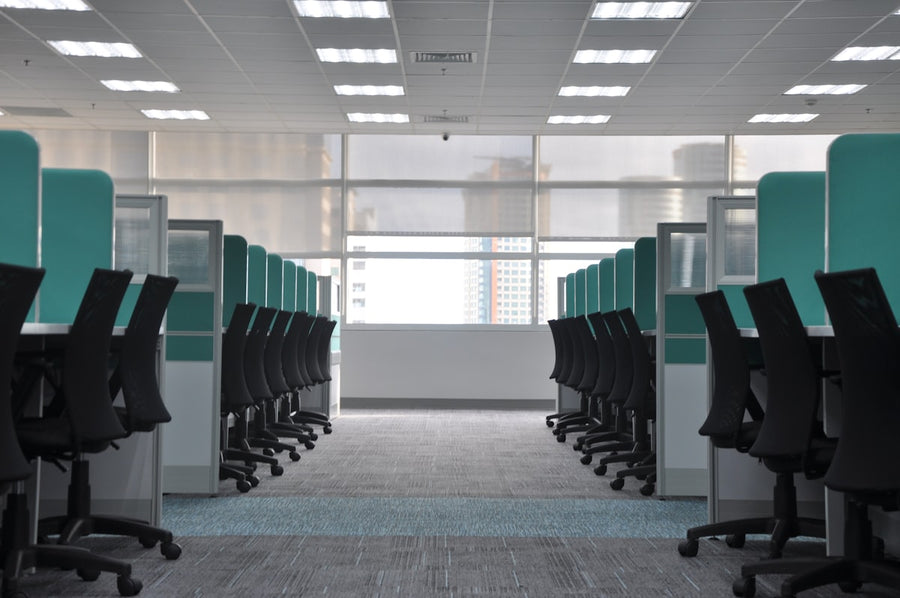 Operators monitoring video walls in a command and control centre design for an Indian enterprise